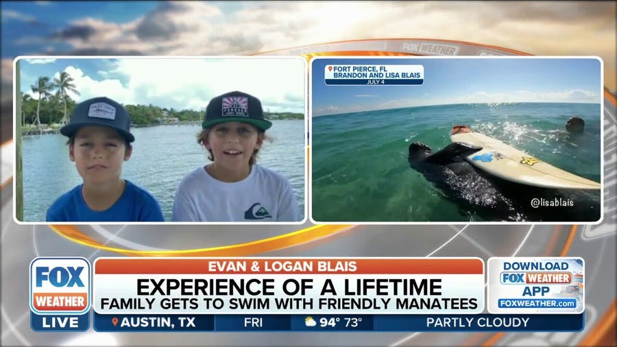 Quite the surprise: Manatees hang with twin brothers surfing off Fort Pierce Inlet