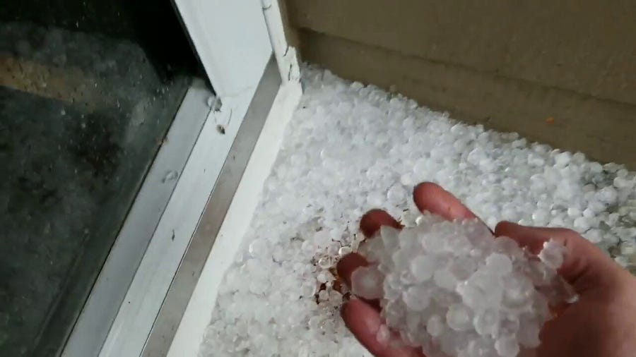 Watch: Hailstones coat ground of Aurora, Colorado