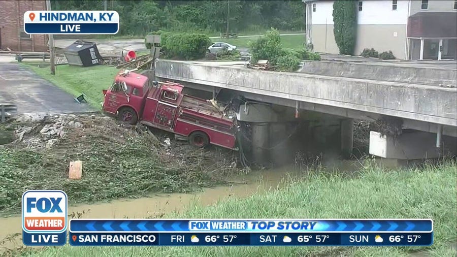 Watch: Firetruck seen swept under bridge in Hindman, KY from record flooding