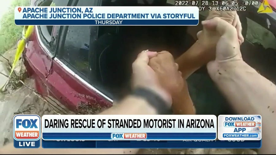 Watch: Daring rescue of stranded motorist in Arizona