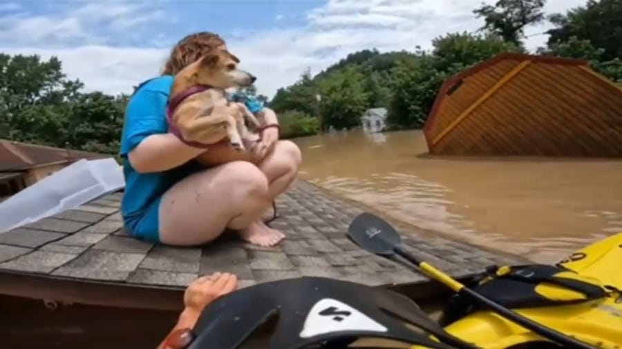 Watch: Kentucky teen, dog rescued from roof surrounded by floodwaters