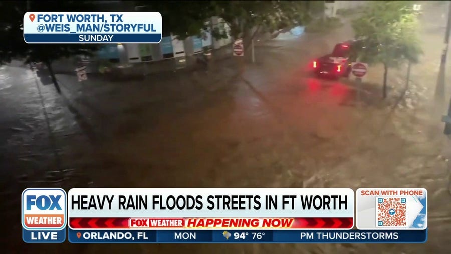 Heavy rain floods the streets of Forth Worth, Texas