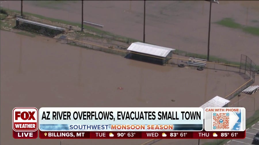 Arizona river overflows, causing mass evacuation of small town