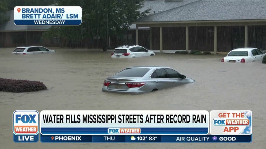 Floodwaters filled the streets of Central Mississippi after record rain