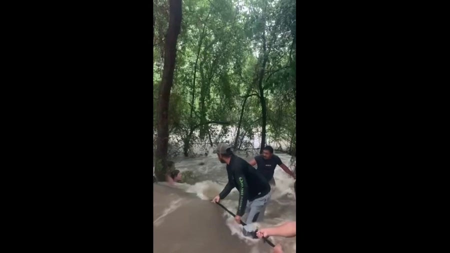 Watch: Dallas school bus driver, bus monitor rescue kids from raging floodwater