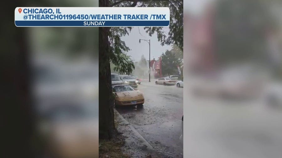 Water seen bursting through sidewalk in Chicago amid heavy rain