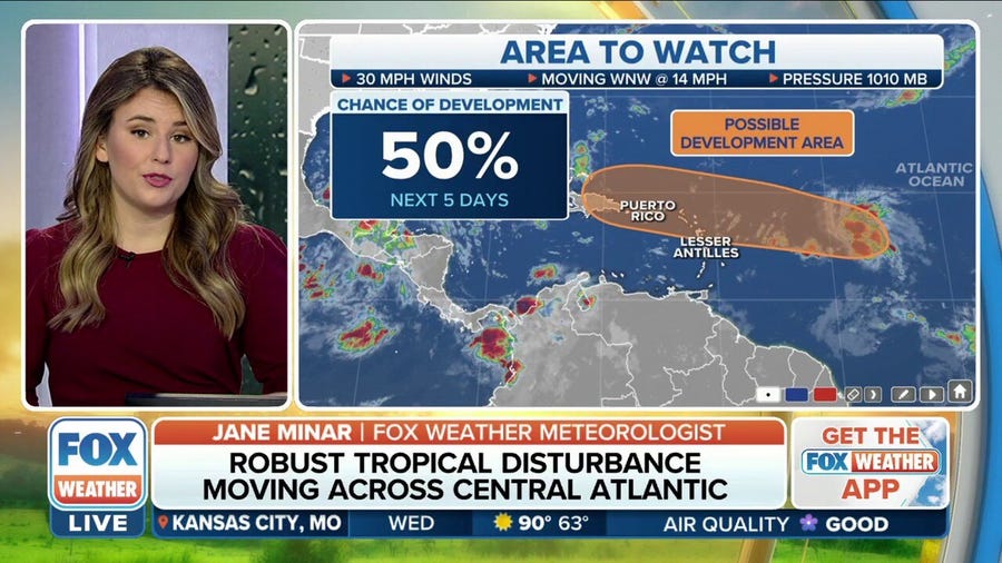 Robust tropical disturbance moving across central Atlantic