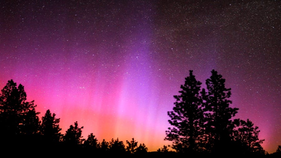 See how crazy weather lights up the sky every color of the rainbow