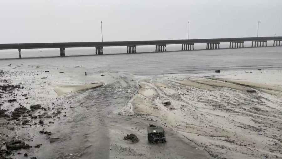 Water being sucked out of Charlotte Harbor as Hurricane Ian approaches