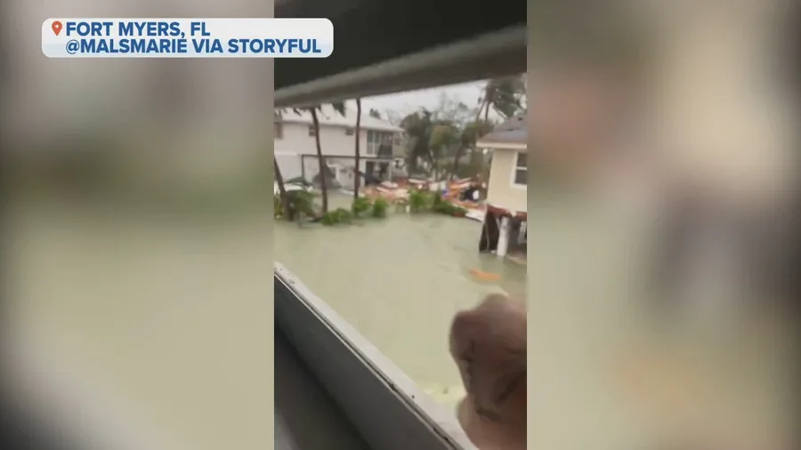 'My house is gone' a woman points to a pile of debris