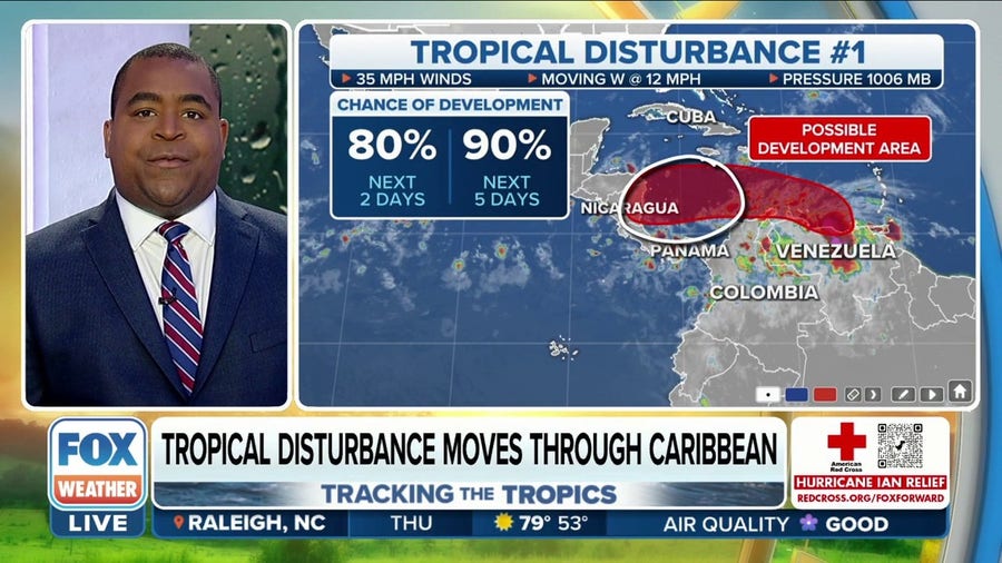 Tropical disturbance with high chance of development moving through Caribbean