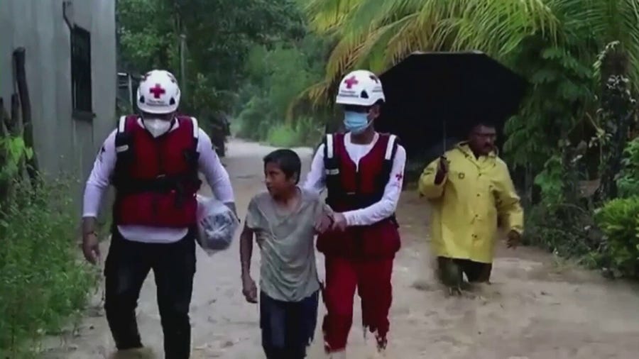 Watch: Torrential rain from Hurricane Julia leads to flooding, rescues in Guatemala