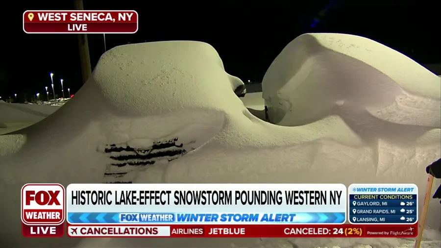 Cars in West Seneca, NY buried under feet of snow