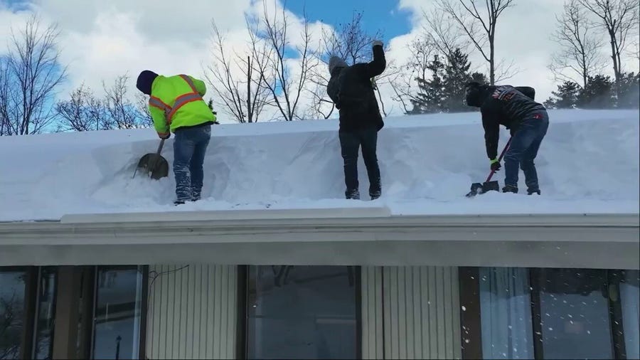Residents shovel record snow off roofs fearing collapse