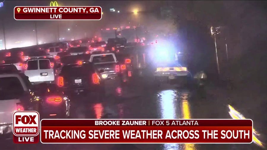 Traffic stopped on I-75 due to flooding in Atlanta metro area
