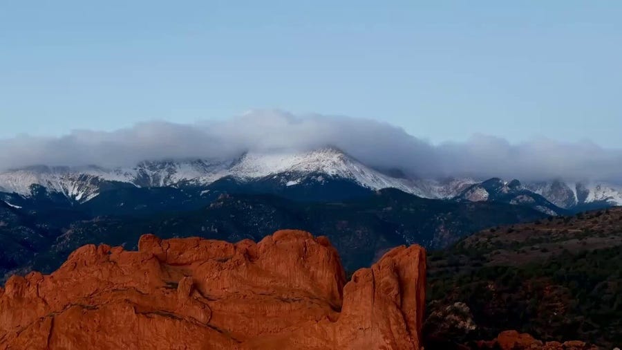 Low-lying clouds roll over Rocky Mountains in central Colorado