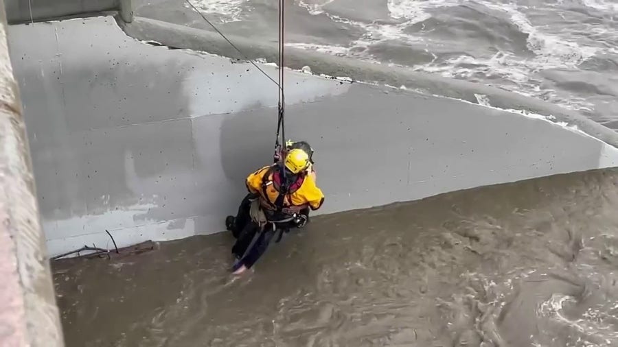 Fire officials rescue man from Santa Ana river bed