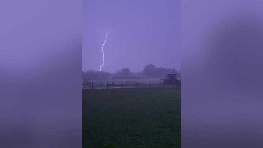 Lightning illuminates early morning sky west of Fort Worth