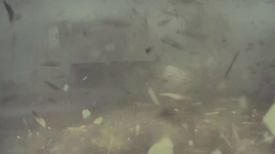 Dashcam footage shows New Orleans tornado flipping a truck