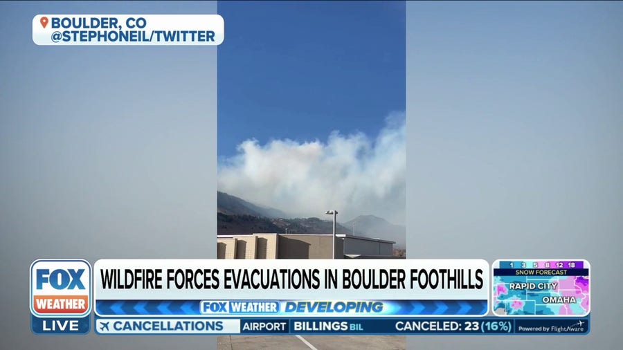 Wildfire burns in mountains west of Boulder, Colorado