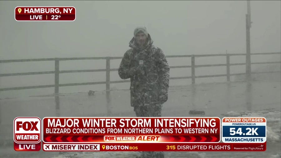 Whiteout conditions in Hamburg, New York as bomb cyclone continues to wreak havoc