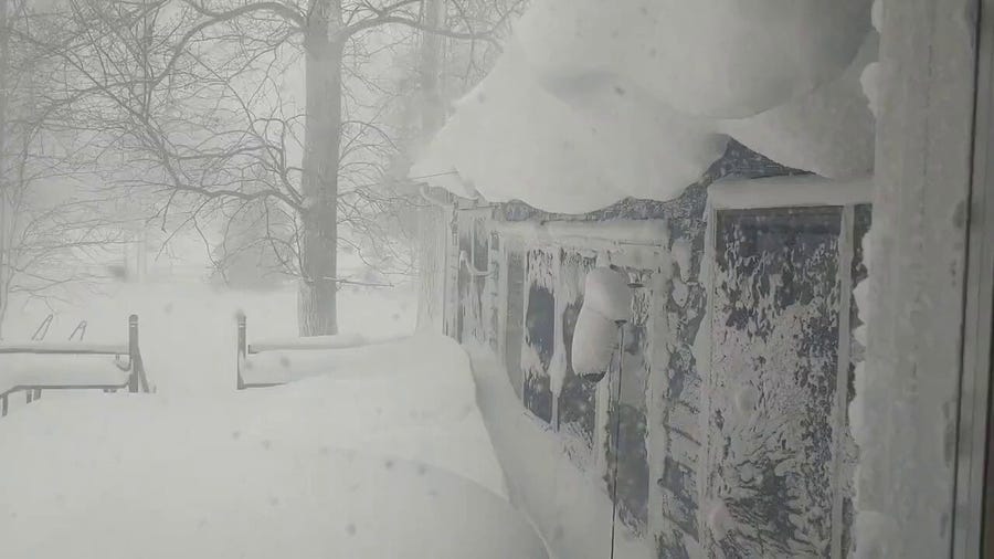 Buffalo, NY homes buried in snow during major winter storm