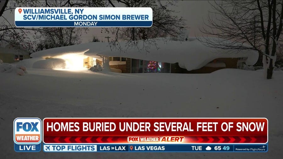 Homes, cars in New York completely covered in snow