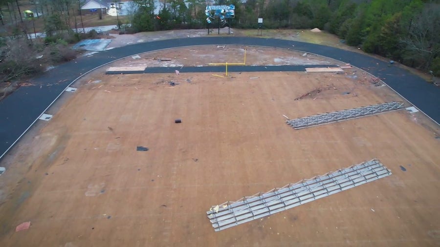 Drone footage shows damage to Arkansas high school from apparent tornado