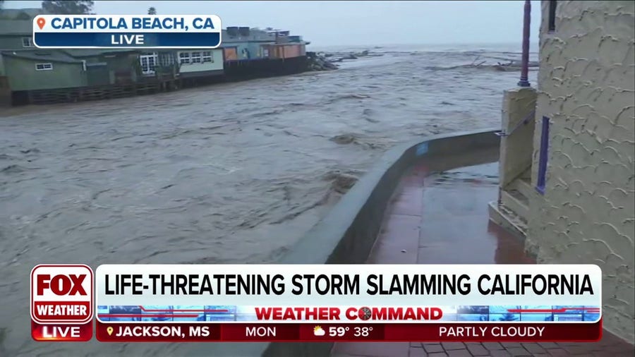 Rapidly moving Soquel Creek pushing debris into Pacific Ocean