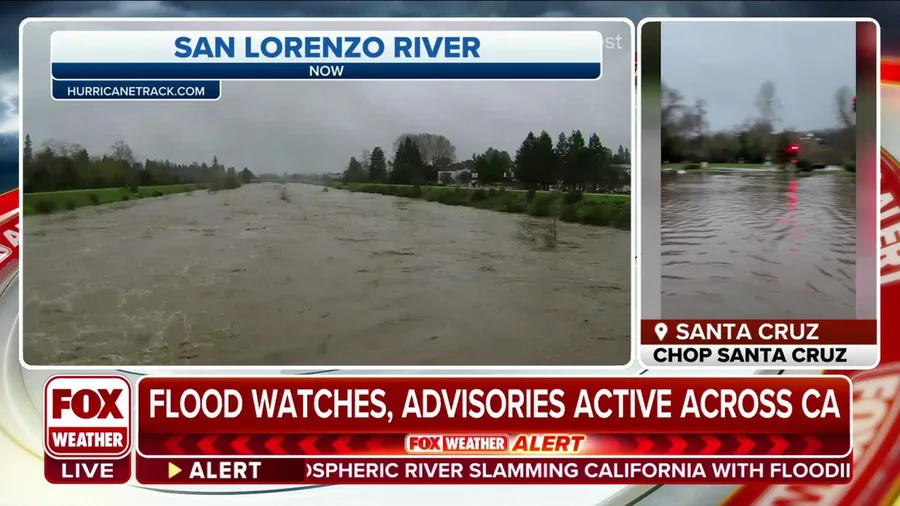 San Lorenzo River over its banks and threatening homeowners