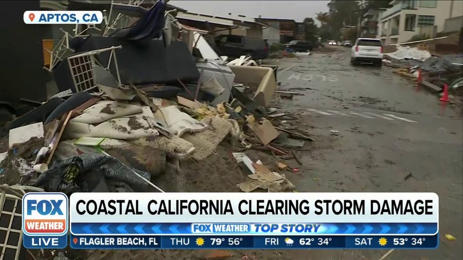 Coastal town in California clears damage to homes, businesses