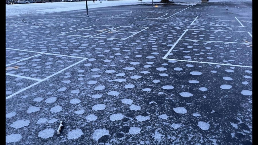 Polka dots of air pockets pop up on icy Utah school lot