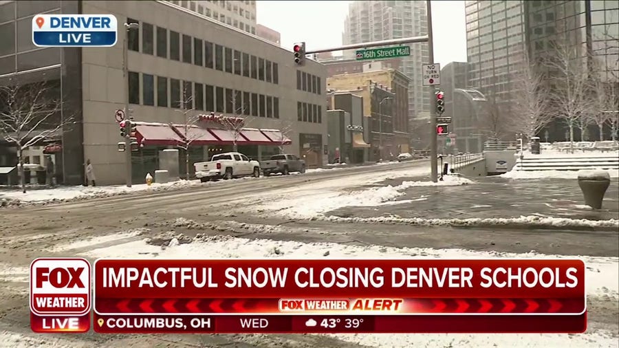 'It's magical': Snow blankets downtown Denver during winter storm