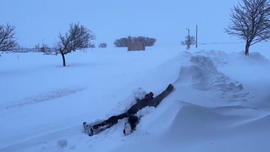 Weather forecaster makes snow angel in Nebraska