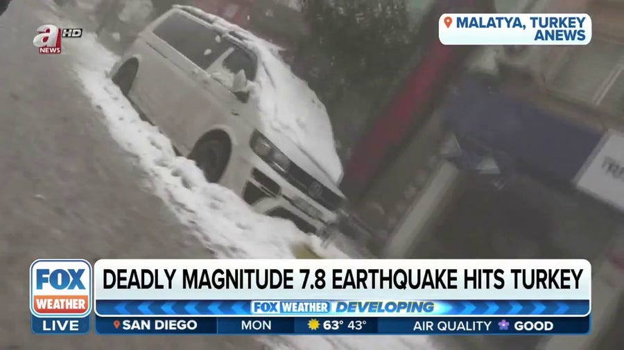 Survivors flee Turkey quake through snow lined streets