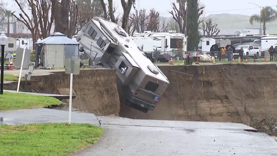 Watch: Motorhome falls into river as flooding eroded embankment