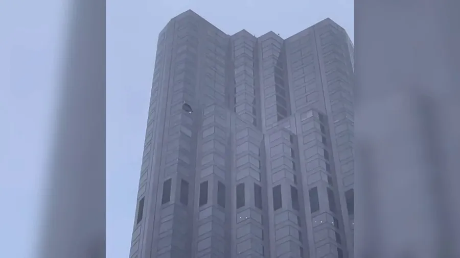 Window glass seen falling from high rise building in SF due to strong winds