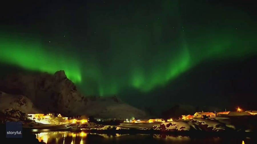 Timelapse captures shimmering aurora above Norwegian village