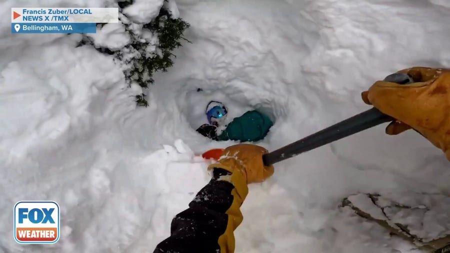 Snowboarder buried alive in snow rescued by skier in WA
