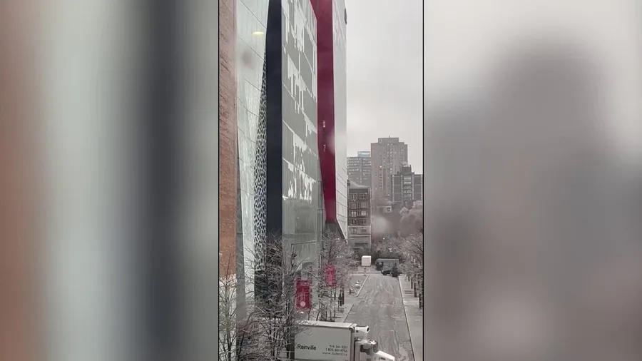 Sheets of ice fall from buildings in Montreal as cold snap hits Canada