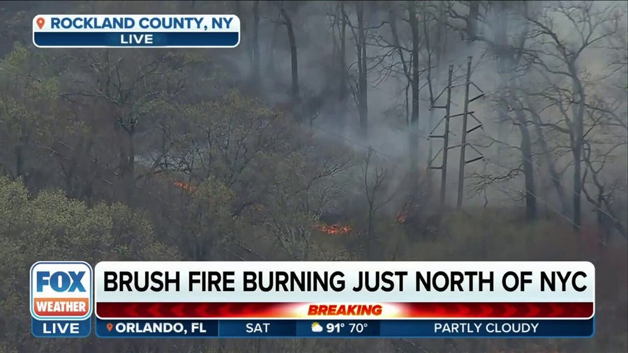 Brush fire threatening homes just north of NYC