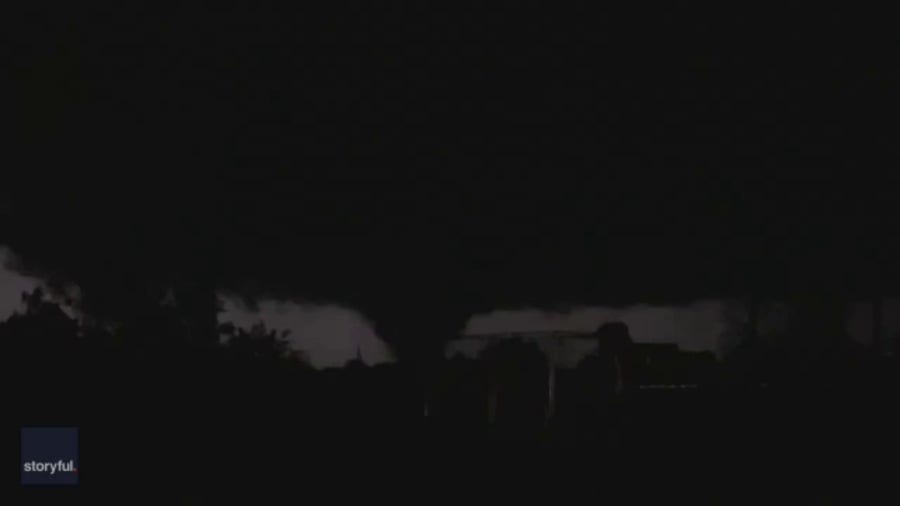 Lightning flashes show silhouette of central Oklahoma tornado