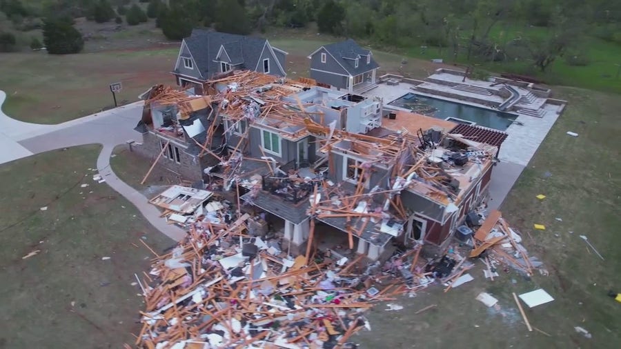 Drone video shows homes flattened, cars tossed from deadly tornado in