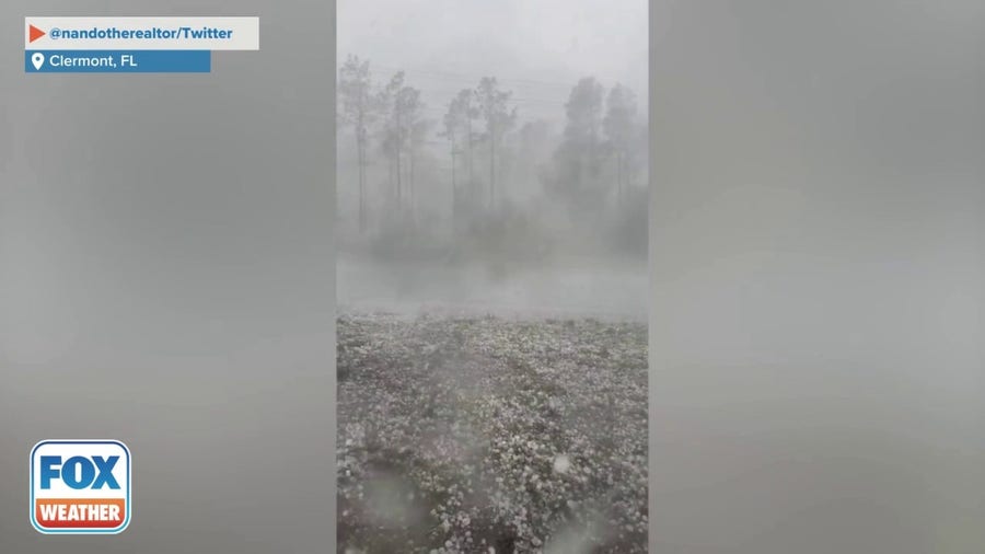 Hail pelts vehicle in Clermont, Florida