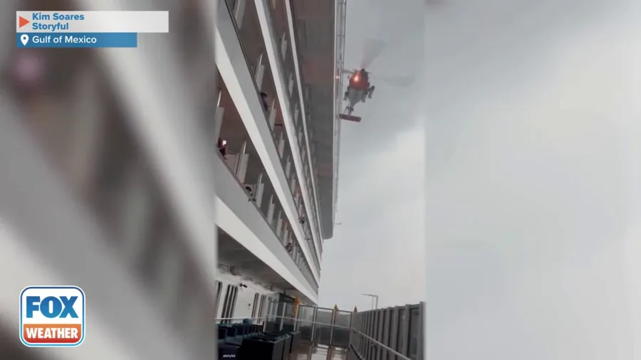 WATCH: Coast Guard helicopter unable to hold steady in severe winds during cruise ship rescue