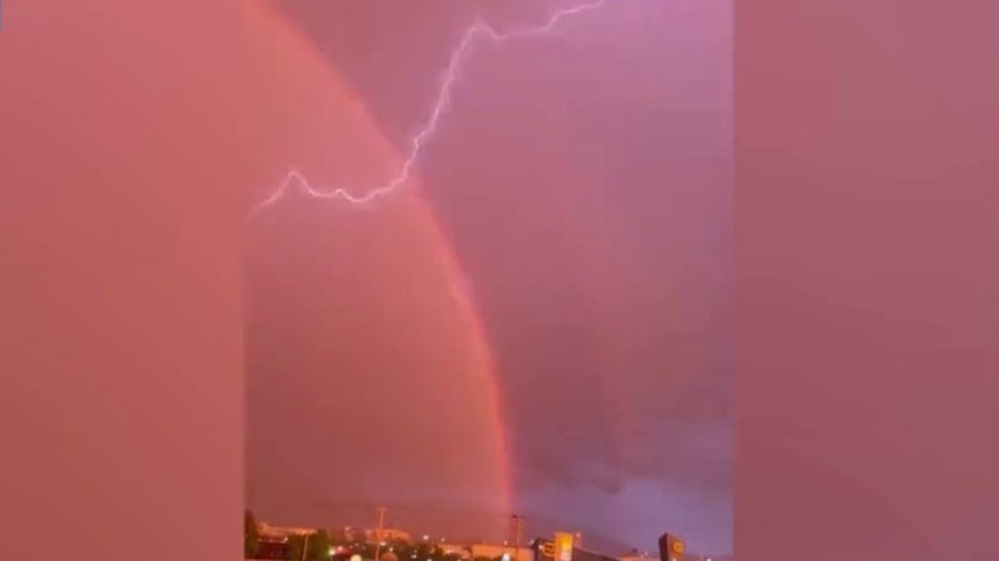 Lightning and rainbows dazzles onlookers in Utah