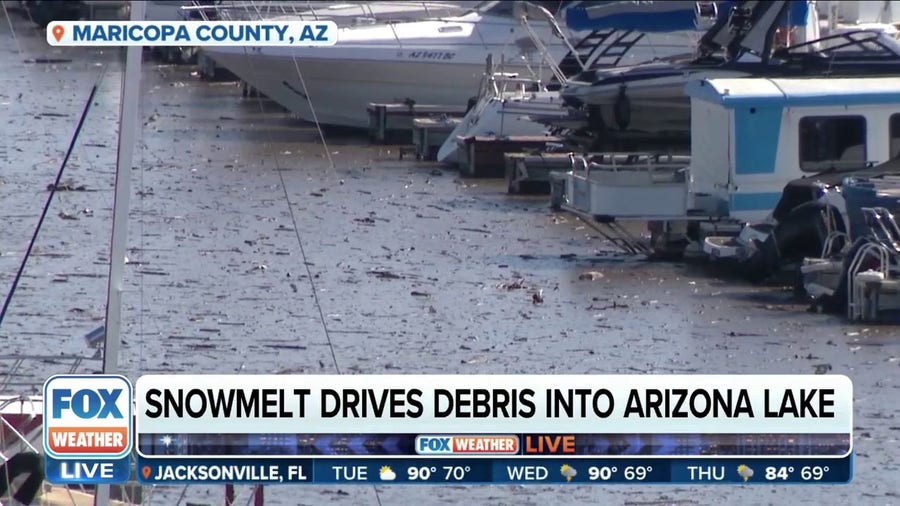Arizona lake filled with debris due to snowmelt  