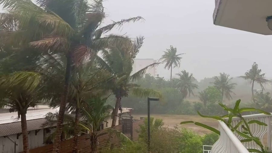 Watch: Palm trees sway as Super Typhoon Mawar approaches Guam