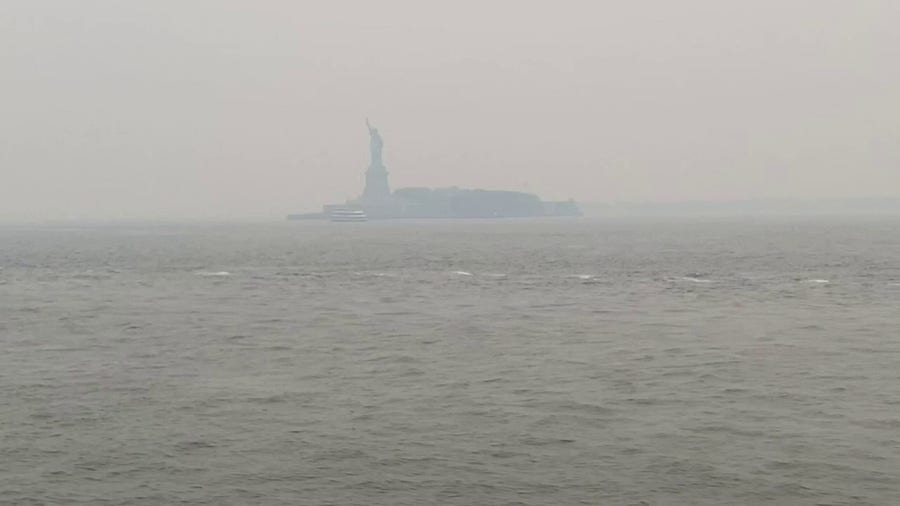 Wildfire smoke shrouds Statue of Liberty as air quality hits 'hazardous' levels