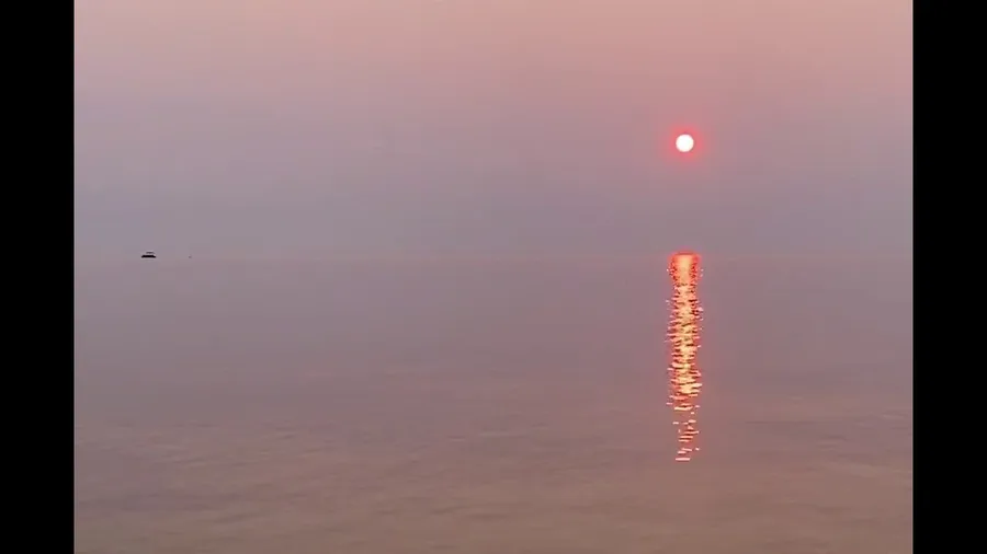 Wildfire smoke creates hazy sky over Lake Michigan